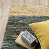 Oriental Weavers Strada STR09 Gold/ Blue Area Rug Corner On Wood