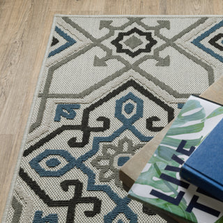 Oriental Weavers Torrey 004Y1 Beige/ Blue Area Rug Corner On Wood Featured