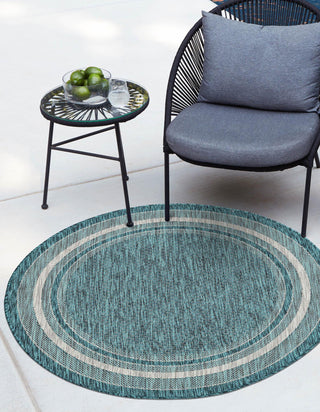 Unique Loom Outdoor Border T-KOZA-20597B Teal Area Rug Round Lifestyle Image