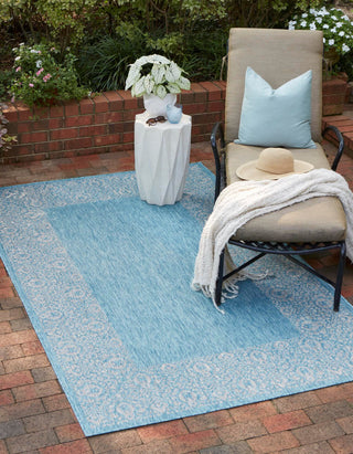 Unique Loom Outdoor Border T-KZOD1 Aqua Area Rug Rectangle Lifestyle Image Feature
