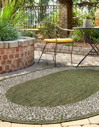 Unique Loom Outdoor Border T-KZOD1 Green Area Rug Oval Lifestyle Image