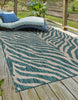 Unique Loom Outdoor Safari T-KZOD25 Teal Area Rug Rectangle Lifestyle Image