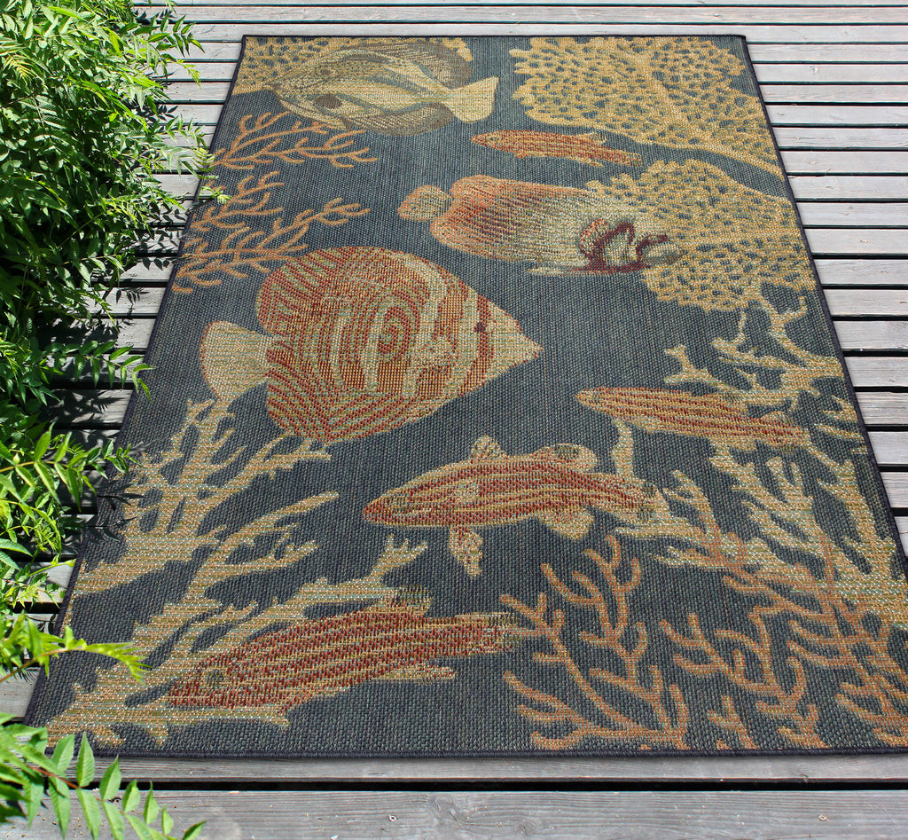 Trans Ocean Patio 6065/33 Fishes Navy Area Rug by Liora Manne Room Scene Image Feature