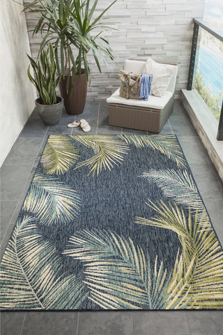 Trans Ocean Portofino 7082/33 Palm Border Navy Area Rug by Liora Manne Room Scene Image Feature