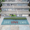 Trans Ocean Frontporch 4507/03 Live Love Lake Blue Area Rug by Liora Manne Room Scene Image Feature