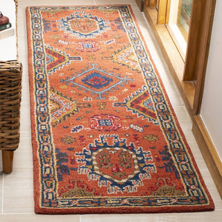 Safavieh Heritage 427 Rust/Navy Area Rug Room Scene