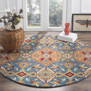 Safavieh Heritage 653 Camel/Blue Area Rug Room Scene