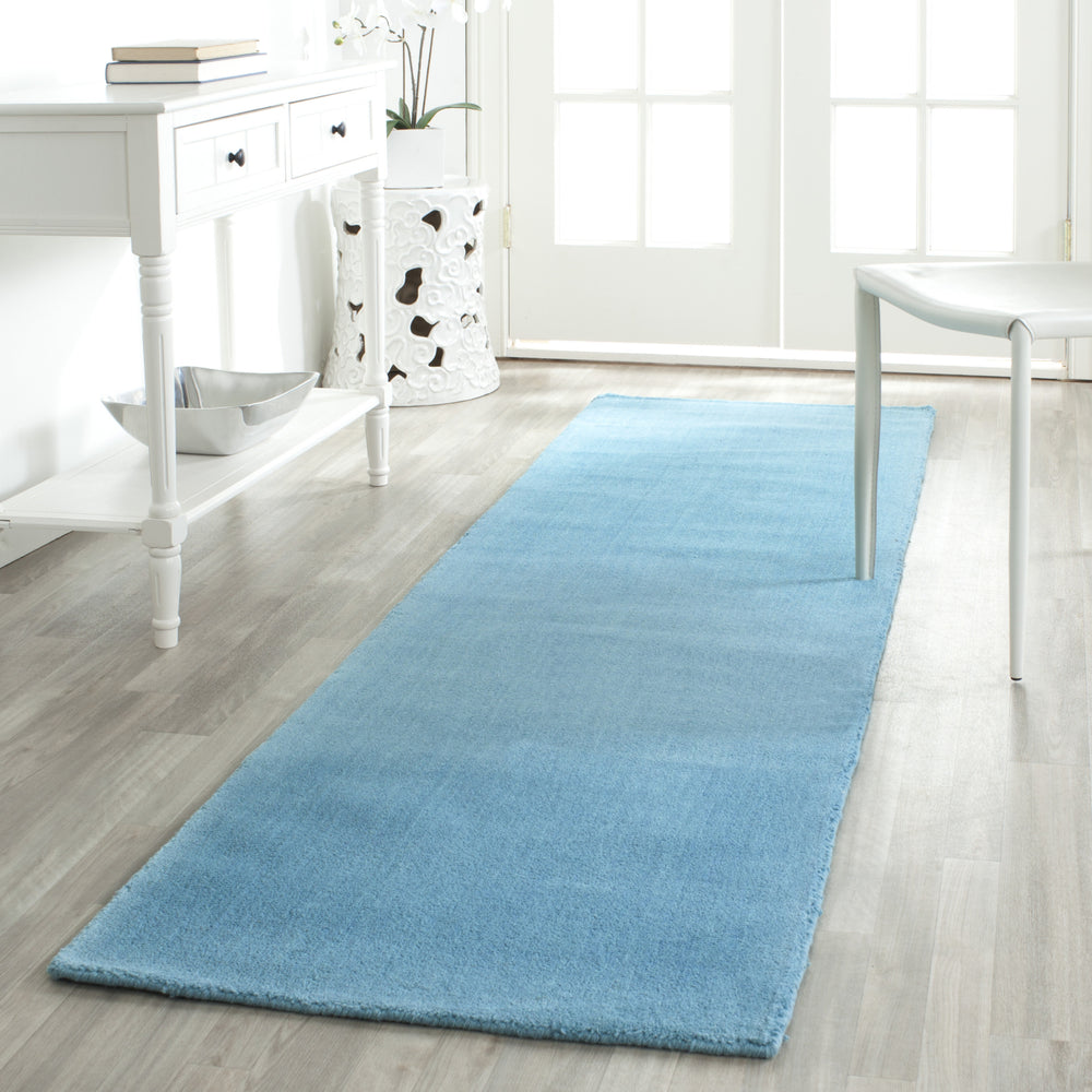 Safavieh Himalaya 610 Turquoise Area Rug Room Scene Feature