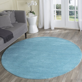 Safavieh Himalaya 610 Turquoise Area Rug Room Scene