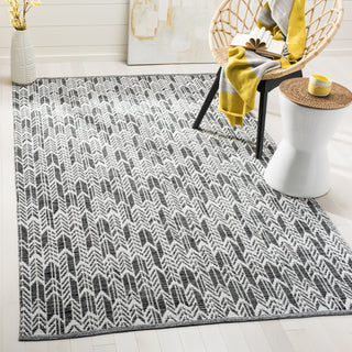 Safavieh Montauk MTK609 Black/Ivory Area Rug Room Scene