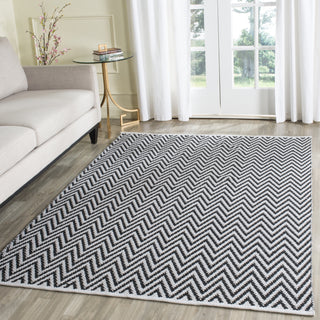 Safavieh Montauk MTK812 Black/Ivory Area Rug Room Scene