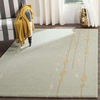 Safavieh Soho Soh303 Light Green Area Rug Room Scene Feature