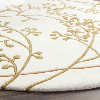 Safavieh Soho Soh305 Ivory/Orange Area Rug Detail