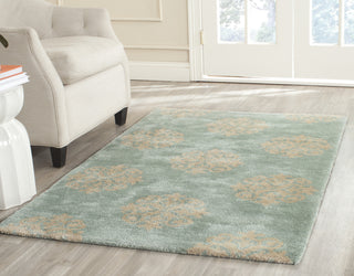 Safavieh Soho Soh424 Turquoise Area Rug Room Scene Feature