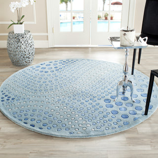 Safavieh Soho Soh654 Light Blue Area Rug Room Scene