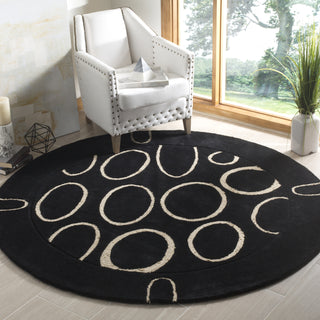 Safavieh Soho Soh714 Black/Ivory Area Rug Room Scene Feature