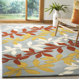 Safavieh Soho Soh764 Blue/Multi Area Rug Room Scene Feature