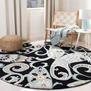 Safavieh Wyndham Nimes Paisley Black/Multi Area Rug Room Scene Feature