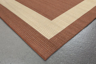 Trans Ocean Terrace Border Rust Area Rug by Liora Manne Corner Shot Feature
