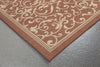 Trans Ocean Terrace Scroll Vine Rust Area Rug by Liora Manne Corner Shot Feature