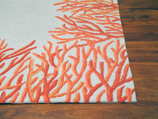 Trans Ocean Spello Coral Bdr Blue Area Rug Room Scene