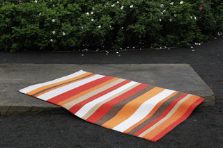 Trans Ocean Ravella Stripe Orange Area Rug Room Scene