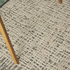 Nourison Vail VAI03 Ivory/Multi Area Rug closeup under chair