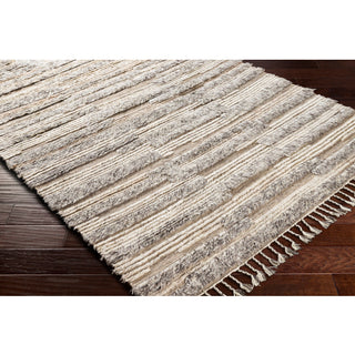 Surya Sahara SAH-2305 Area Rug on wood floor