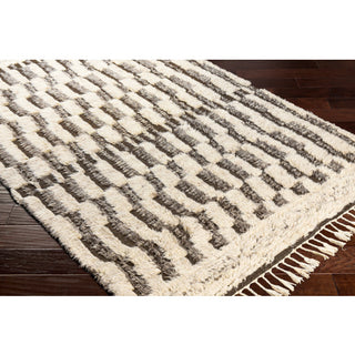Surya Sahara SAH-2310 Area Rug on wood floor