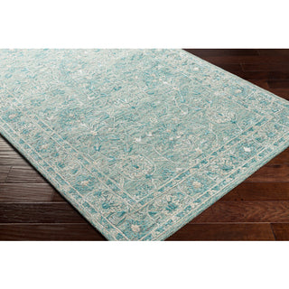 Surya Shelby SBY-1012 Area Rug on wood floor